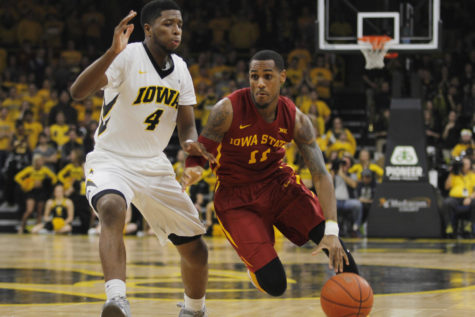 Monte Morris drives the ball against Iowa in the Cy-Hawk mens basketball game in Iowa City on Dec. 8, 2016. 