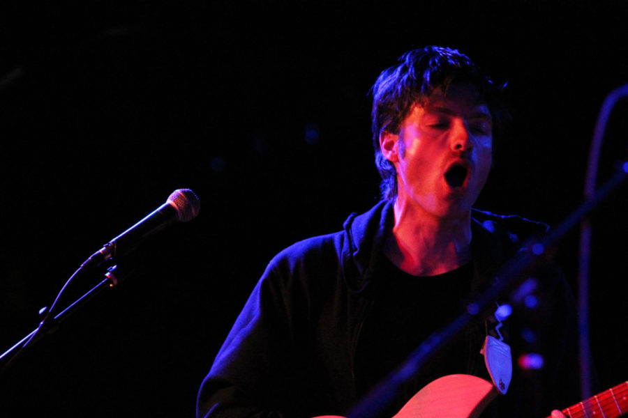 Dylan Sires, vocalist and guitarist for Des Moines band Sires, performs at the M-Shop Feb. 15. Sires opened for NE-HI. 