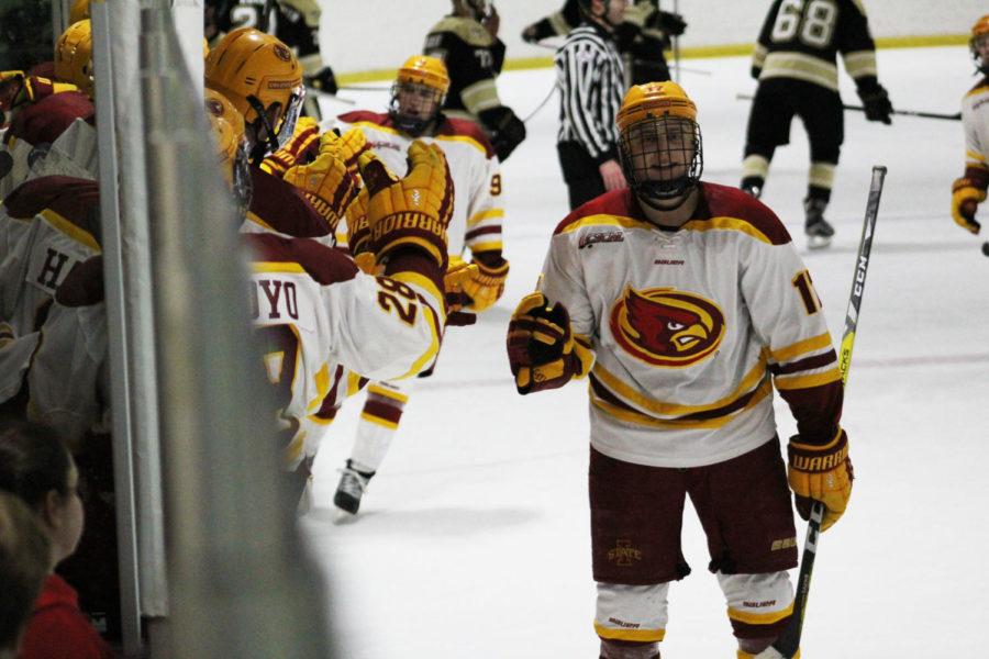 Sophomore forward Aaron Azevedo celebrates his goal during the game against Colorado Friday night. He scored two goals during the second period, contributing to the final score of 8-6.