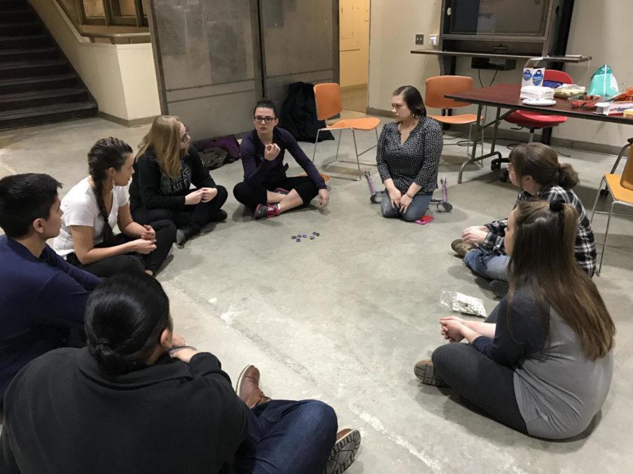 Haley Strass teaches United Native American Student Association members how to count in Myaamia, an Algonquin language formerly spoken in the Midwest, on Feb. 15, 2017 in the Design Building.