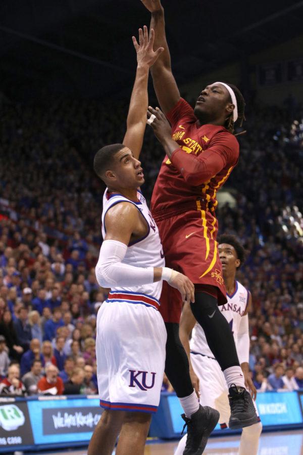 Solomon Young goes up for a shot over Kansas Landon Lucas at Allen Fieldhouse in Lawrence, Kansas on Feb. 4, 2017. Iowa State beat Kansas 92-89 in overtime, the Cyclones first win in Lawrence since 2005.