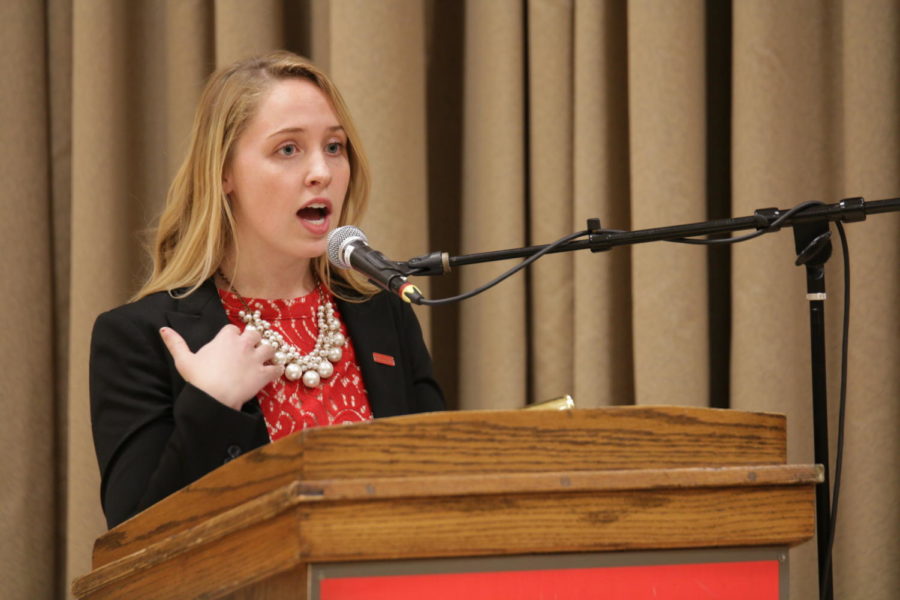 Vice presidential candidate Rachael Barnes responds to a question Tuesday evening during a Student Government debate against vice presidential candidate Cody Smith.