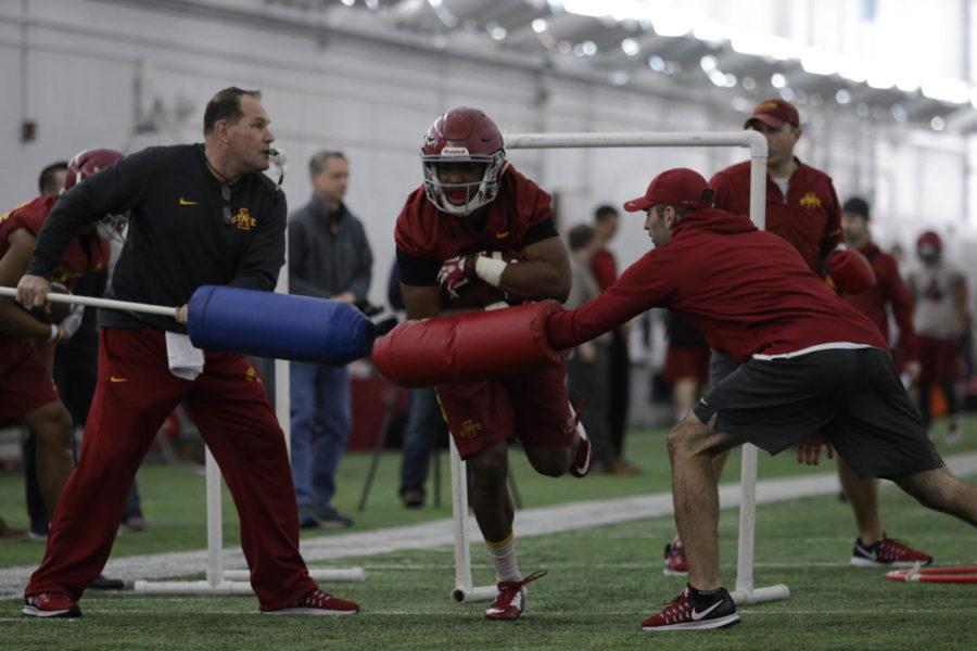 Iowa State's running back group performs a series of drills that encourage ball security at their first practice of 2017.