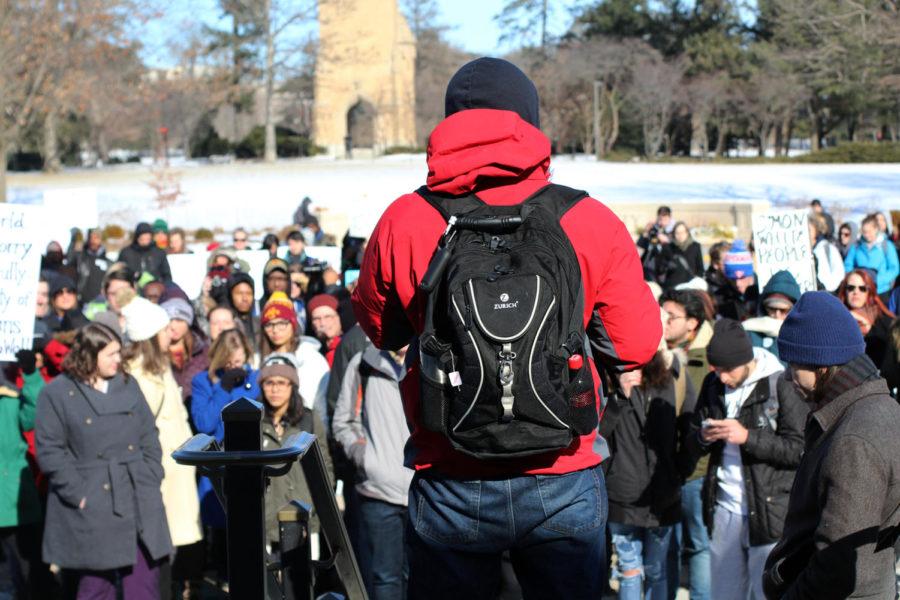 Wesley Harris Jr. addresses a crowd of Ames community members and students as they prepare to march across campus on Thursday afternoon. The march, dubbed Hoodies and Hijabs Solidarity March, began at the Memorial Union and ended just outside Parks Library. 