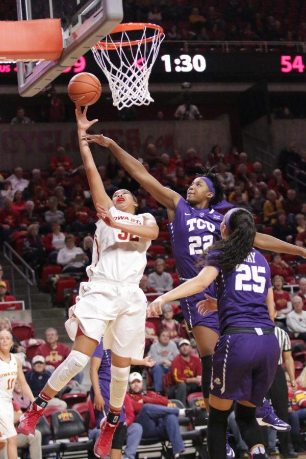 Iowa State sophomore Meredith Burkhall drives and scores late in the 3rd quarter versus the TCU Horned Frogs. Burkhall finished the game with 9 points in 25 minutes of play.