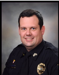 Sgt. Derek Grooters is on administrative leave after shooting at a suspect vehicle that opened fire on a crowd on Sunday morning in Campustown.
