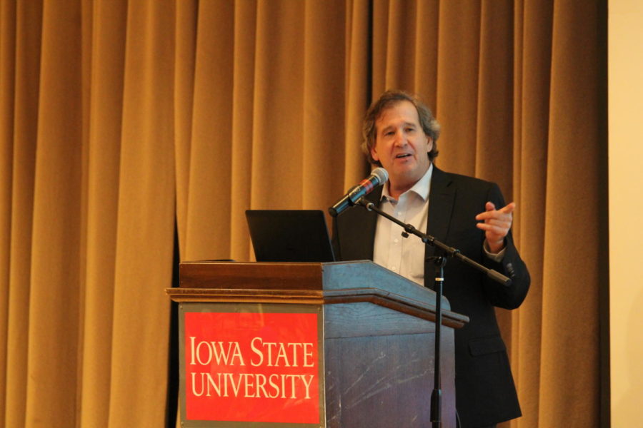 Distinguished Professor of Agricultural and Environmental Economics James Shortle speaks to a packed Sun Room about policy options in regards to improve water quality and environmental health in Iowa on Feb 13. Around 250 students and Ames community members were in attendance.