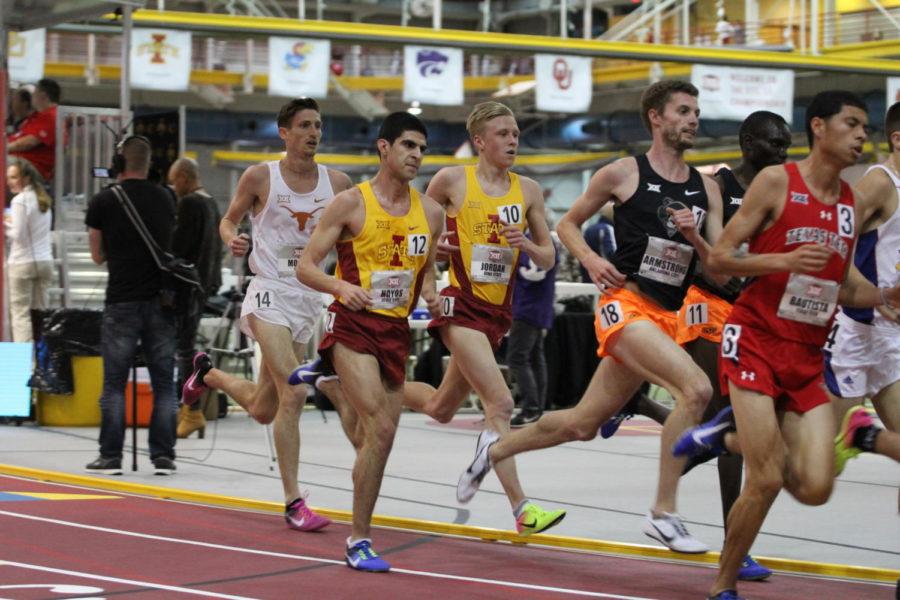 Senior Kevyn Hoyos and freshman Andrew Jordan run in the mens 5000-meter Feb 24 during the Big 12 Track and Field meet. Hoyos came in third with a time of 14:24.86 and Jordan came in fourth with a time of 14:25.63. 