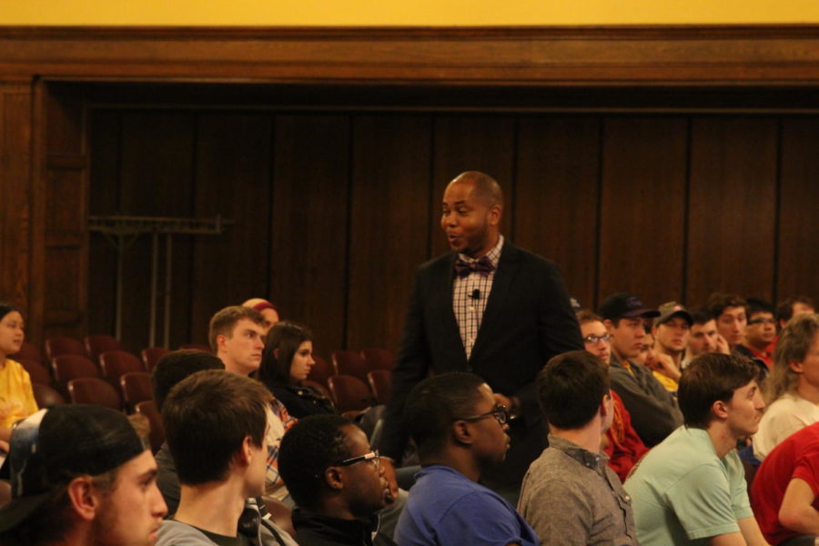 Bisi Ezerioha speaks to students in the Great Hall of the Memorial Union on Feb 16. Ezerioha, who is an engineer, race car driver and CEO of his own company, Bisimoto Engineering, talked to engineering students about his life in college and afterwards while working with race cars and his own company. 