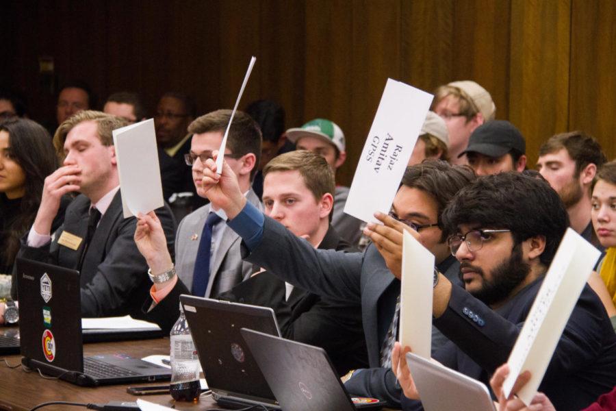 Student Government senators vote on a resolution Wednesday night that will request that all Iowa State administrators act to the fullest legal extent of their ability to protect DACA and undocumented students attending Iowa State University.  