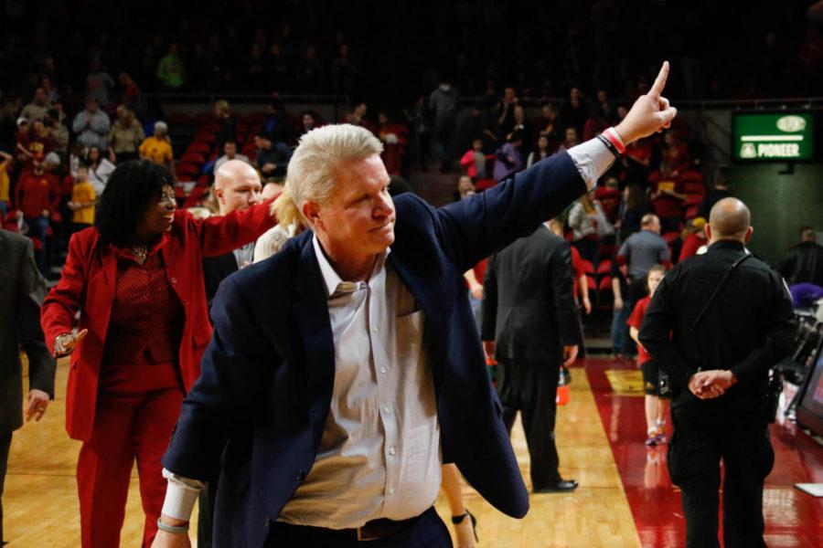 Head womens basketball coach Bill Fennelly salutes the crowd following the Cyclones 75-69 win over No. 22 Kansas State. 
