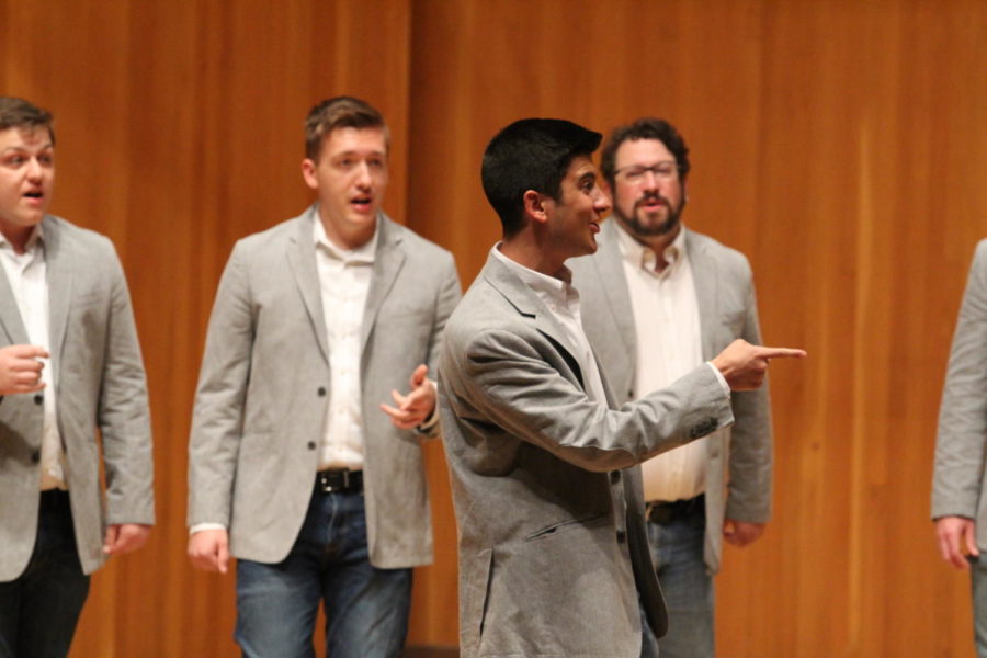 Members of the a cappella group Shy of a Dozen perform during the Sigma Alpha Iota Spring Benefit Concert in the Music Hall on March 28. The concert was held for students and occurs on an annual basis. 