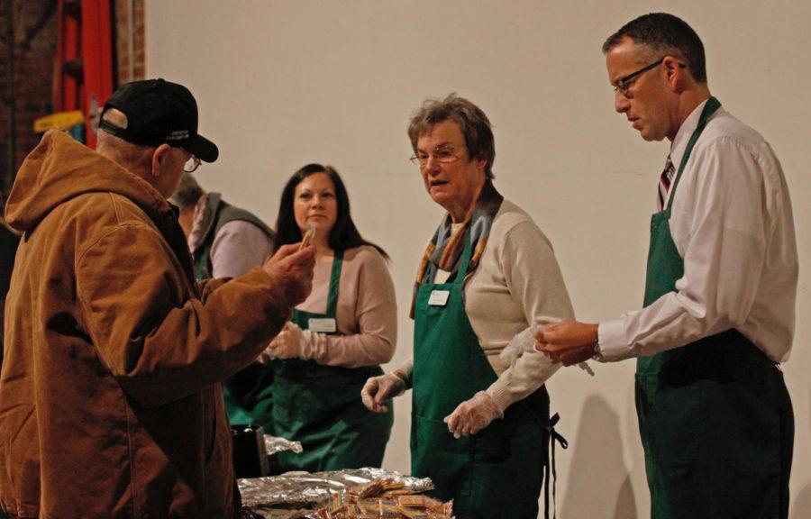 Mayor Ann Campbell and City Councilman Tim Gartin serve soup to attendees at the Scoop A Soup event Nov. 17, 2015, at City Hall. The event took place in conjunction with National Hunger and Homelessness Awareness Week.