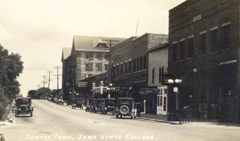 The Lincoln Way Champlin Block, 1928. Period automobiles are seen lining the street, taken from the northwest. The original Champlin building is to the far right, and was demolished in 2014. 