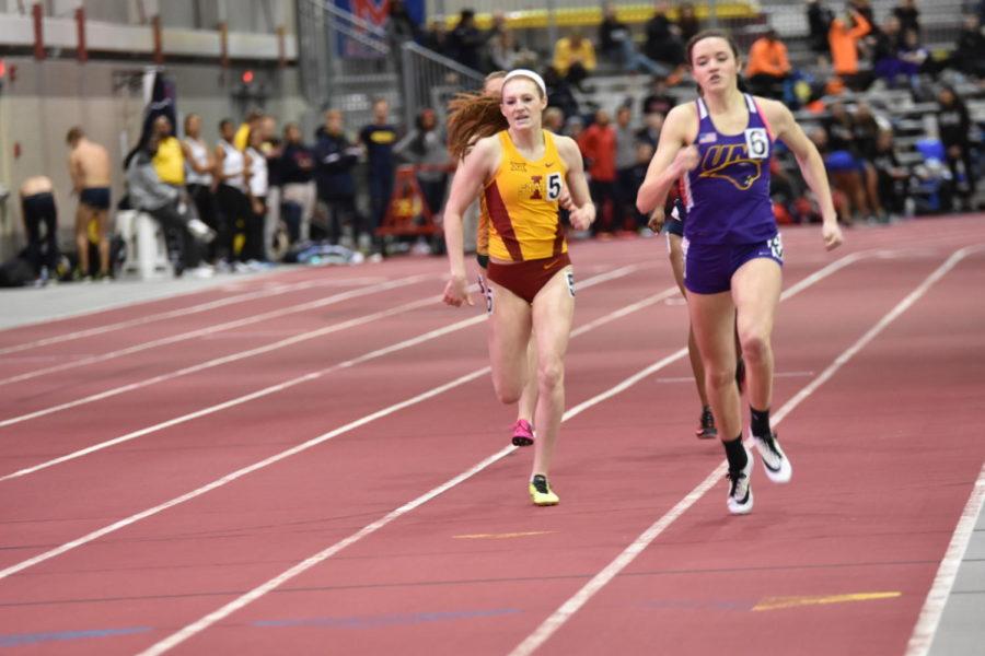 Sophomore Emma Whigham runs in the womens 400 meter during the Iowa State Classic on Feb. 13.