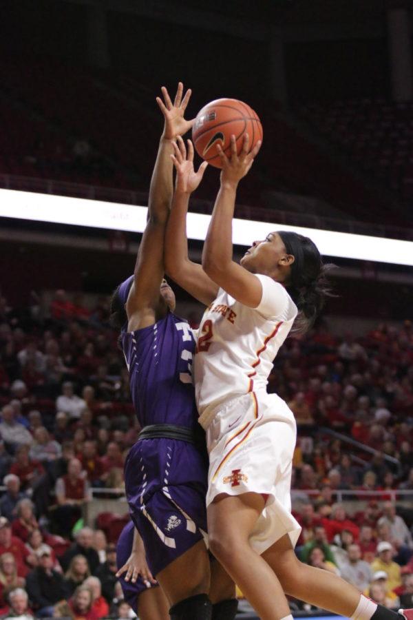 Seanna Johnson, Iowa State senior, attempts a well contested layup in the midst of the Cyclones 15-point comeback in the second quarter. Johnson finished the game with 9 points in 37 minutes on the floor.