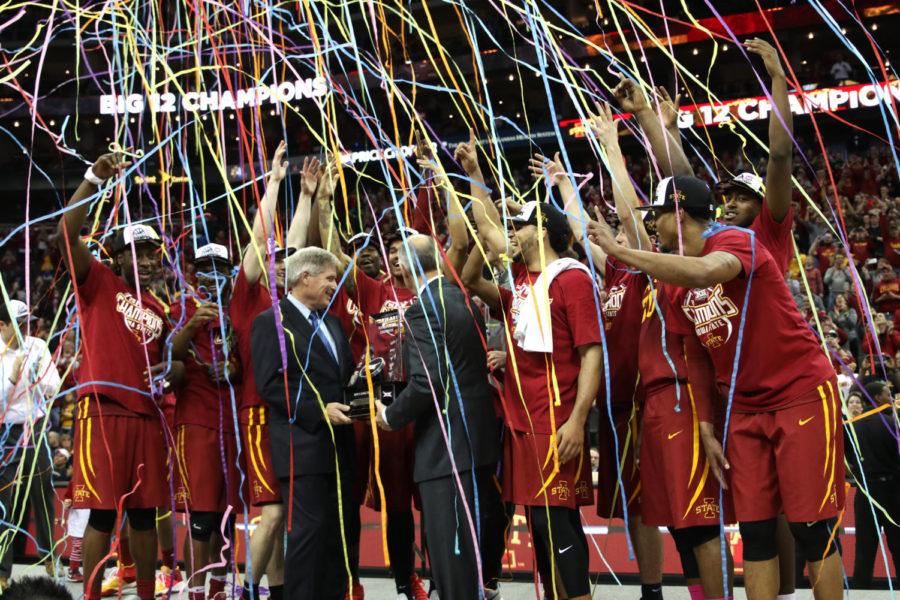 Iowa State celebrates while receiving the Big 12 Championship trophy after beating West Virginia 80-74 on Saturday at the Sprint Center in Kansas City, Missouri.