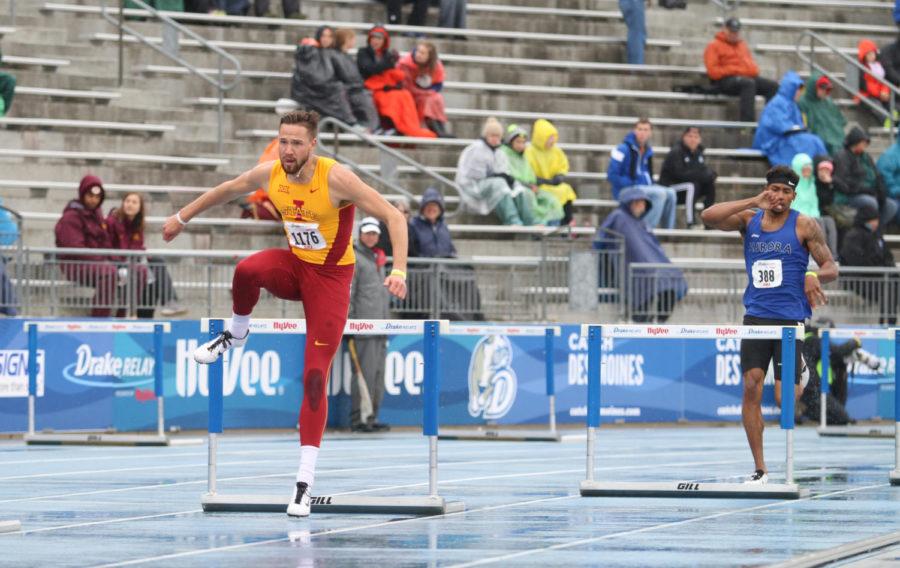 Junior Derek Jones jumps over a hurdle during the mens 400-meter hurdles at the Drake Relays April 30. Jones placed fifth with a time of 51.98.