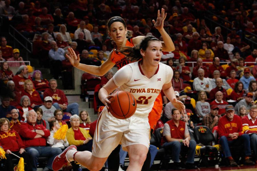 Sophomore Bridget Carleton drives to the basket during Iowa States 61-48 win over Oklahoma State on senior night at Hilton Coliseum. Carleton finished with seven points. 