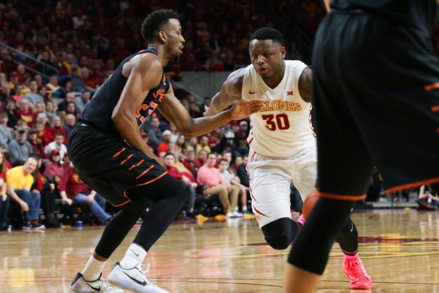 Deonte Burton drives through the lane against Oklahoma State on Tuesday. The Cyclones beat the Cowboys 86-83, marking their sixth-straight win. 