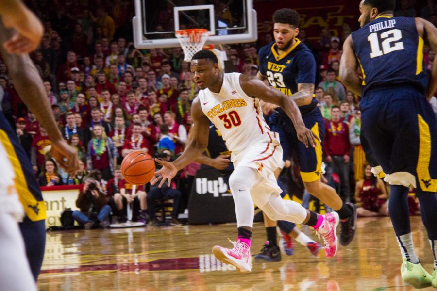 Redshirt senior Deonte Burton drives through the defense during a game against West Virginia, Jan. 31 in Hilton Coliseum. After trailing early, the Cyclones lost 85-72, and move on to 13-8 on the season, and 5-4 in conference play. 