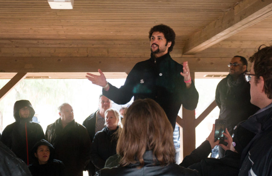 Sean Carlton-Appleton of Ames Iowa explains to the protestors the importance of keeping the march calm and organized. The Black Lives Matter affiliated protest stretched through downtown Ames from Brookside Park to the Ames United Church of Christ March 25.