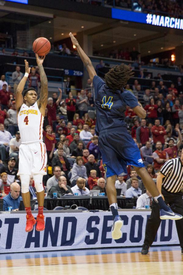 Junior Donovan Jackson takes a three point shot during a game against the Nevada Wolf Pack, March 16 in Milwaukee Wisconsin in the first round of the NCAA tournament. The Cyclones won 84-73, and will play Purdue this Saturday in the second round of the tournament.
