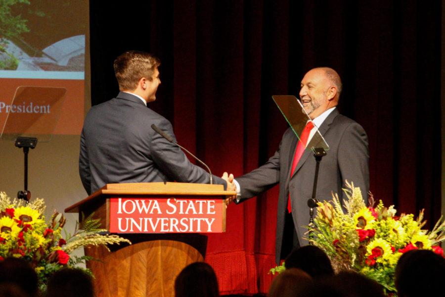 Student Body President Cole Staudt shakes University President Steven Leaths hand before Leaths annual address in the Great Hall of the Memorial Union on Sep 14, 2016.