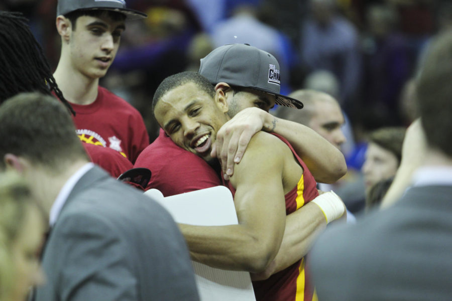 Then-senior Bryce Dejean-Jones embraces then-redshirt junior Abdel Nader after Iowa State defeated Kansas 70-66 in the 2015 Big 12 Championship final on March 14 at the Sprint Center in Kansas City, Mo.