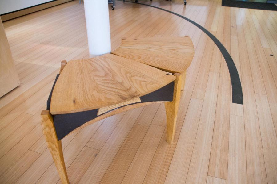 This bench, located in Morrill Hall (specifically in the Christian Peterson museum) was crafted out of wood from Iowa States TreeCYclilng program, which takes trees that stood around campus, and turns them into benches.