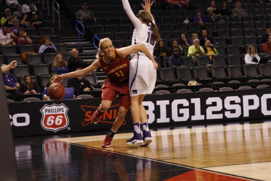 Iowa State junior Jadda Buckley is cut off by Kayla Goth of Kansas State as she attempted to drive towards the hoop. Goth was called for a foul on the play.