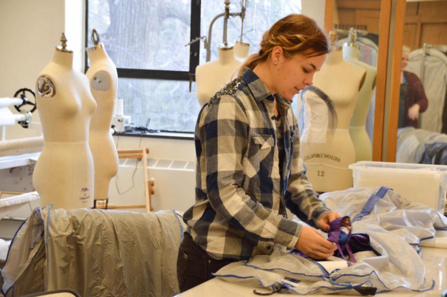 A designer checks her garments in during the garment turn in in LeBaron Hall on March 6. 