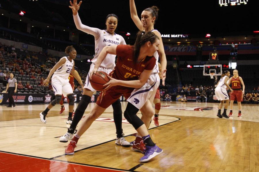 Iowa State sophomore Bridget Carleton looks for a teammate after being trapped by Kansas State defenders at the Big 12 tournament in Oklahoma City.