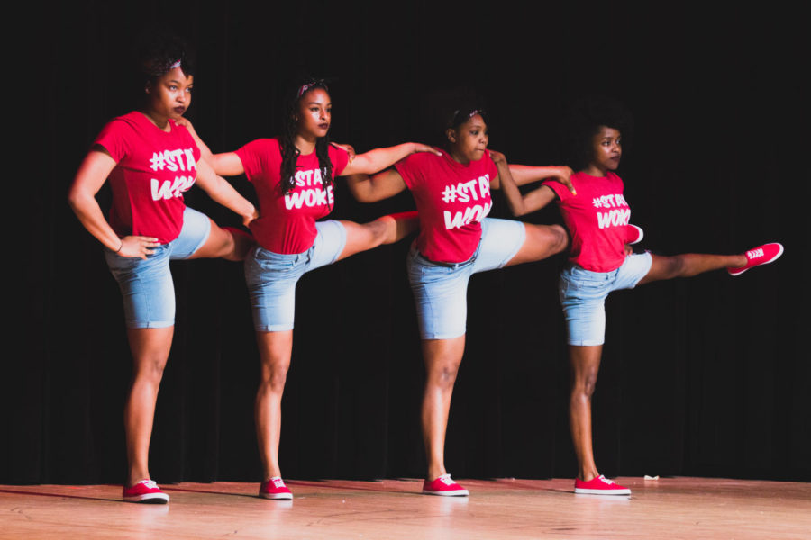 Members of Delta Sigma Theta participants perform their recited step routine in front of a crowd of approximately 200 audience members in the Great Hall of the Memorial Union on Saturday evening. Delta Sigma Theta took first place in the Greek Fest competition.