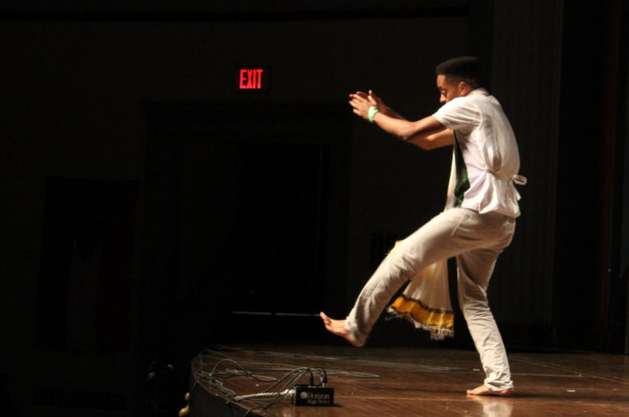 A member of the East African Dance Team performs during African Night in the Ames City Auditorium on April 22. 