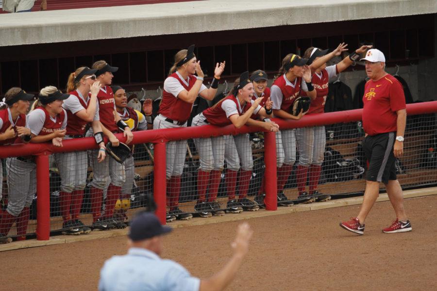 The Iowa State softball team cheers as two runs are scored in the fourth inning on Sept. 16, 2016.