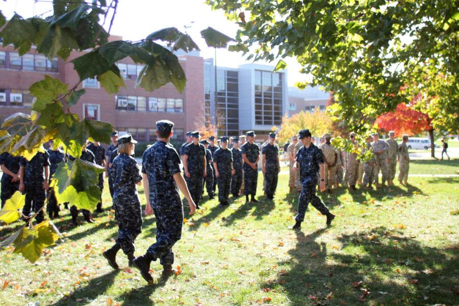 NROTC midshipmen stand outside the Armory in preparation to march to the Memorial Union and donate blood for the annual Iowa State Blood Drive in 2015.