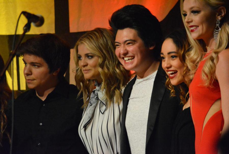 Derek Lutt, freshman in pre-business, poses for a picture next to Lauren Alaina after being announced the first place winner of singing competition Cyclone Voice for his performance of "Run Away With Me" by Kerrigan-Lowdermilk in the Great Hall of the Memorial Union on Apr. 6.