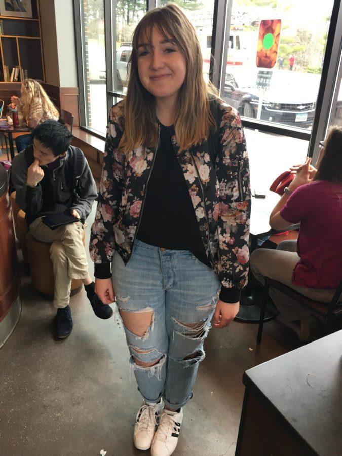 Maddie+Darveau%2C+junior+in+pre-business+and+apparel+merchandising%2C+stopped+into+Starbucks+completely+on+trend+with+white+sneakers%2C+distressed+jeans+and+a+floral+bomber.