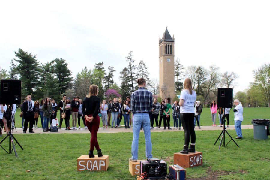 Speakers who participated in the Voices campaign and Daily editor Sarah Muller address the crowd on First Amendment Day April 21, 2016. 