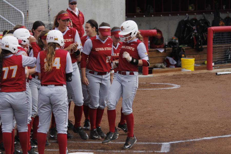 Iowa+State+freshman+Sami+Williams+is+met+at+home+plate+by+her+team+after+hitting+a+home+run+in+her+first+at+bat+against+Oklahoma+State+on+Saturday%2C+April+15.%C2%A0