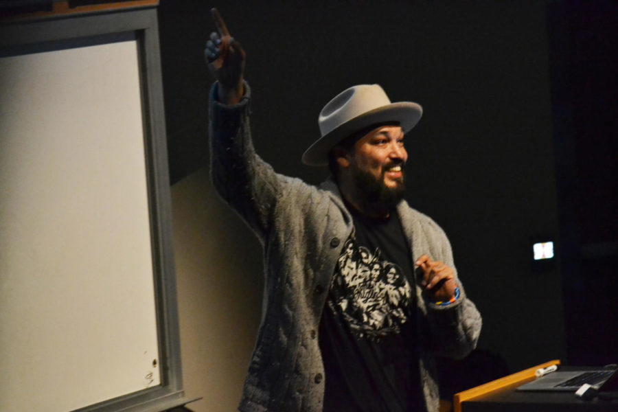 Kiowa and Choctaw artist, screenwriter, and filmmaker, Steven Paul Judd, speaks to students and faculty alike in the Kocimski Auditorium April 6. His innovative artwork incorporates the Native American perspective into pop American culture. Judd uses several mediums which includes: pop-art, paintings, stop-motion films, photography, and even burnt toast art. 