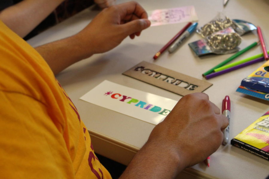 Students make arts and crafts in the LGBT services center on April 14.