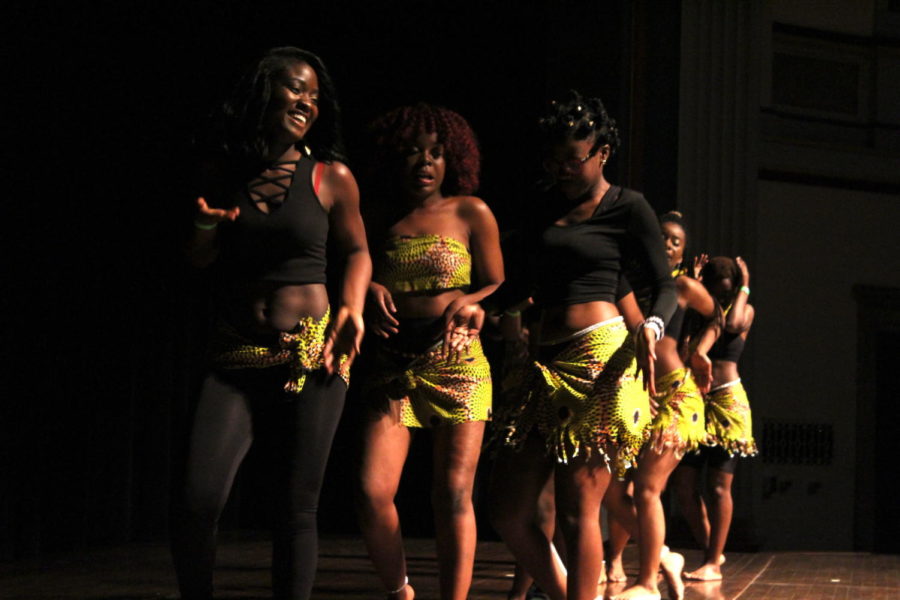 The women of the West African Dance Team perform during African Night in the Ames City Auditorium on April 22. 