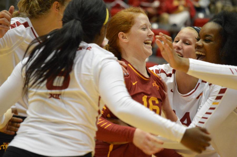 The Iowa State volleyball team celebrates after redshirt freshman libero Hali Hillegas makes a save in the first set against West Virginia Nov. 2, 2016. The Cyclones went on to beat West Virginia 3-0. 