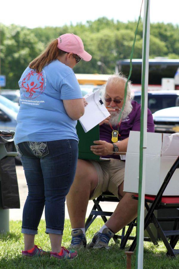 Ray Strekal, cycling competition organizer oversees the event during Special Olympics of Iowa Summer Games on May 25.