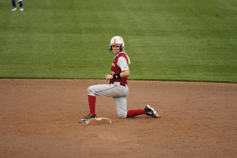 Iowa State freshman Sami Williams looks to her first base coach for instructions while on second base.