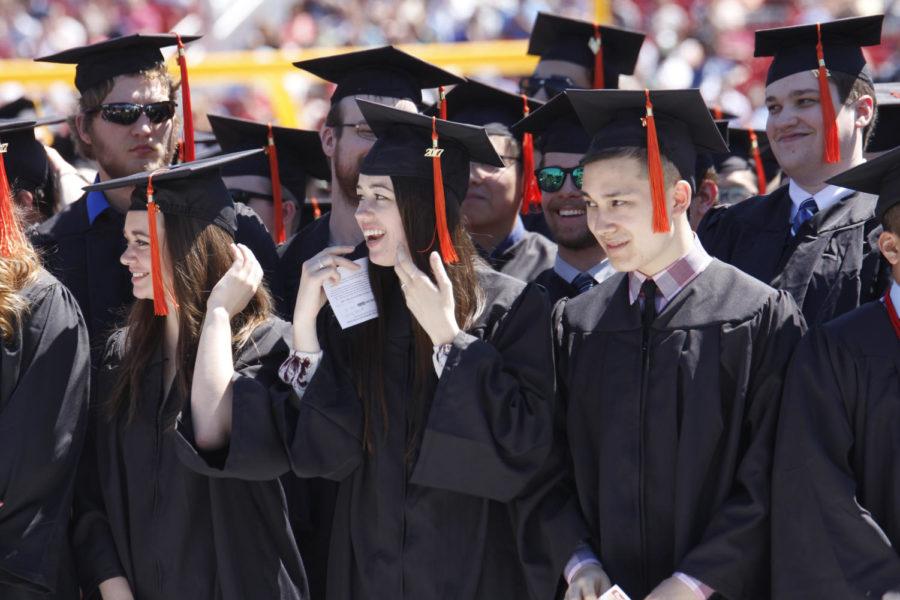 Iowa State graduates celebrate as they move their tassel from the right side of their cap to the left. The tradition of turning tassels is said to represent moving from candidate to graduate.