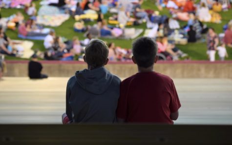Families watch the movie Trolls from the stands of Jack Trice Stadium. The Jr. Cyclone Club sponsored its fifth annual Movie Night at Jack Trice Stadium on Saturday, May 13. 