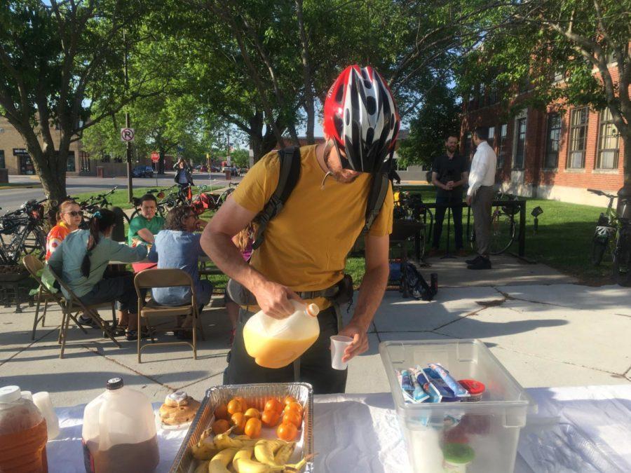 A cyclist picked up the food and drink.